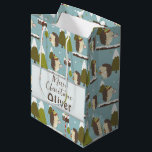 Funny Christmas Hedgehogs Kids Name Medium Gift Bag<br><div class="desc">This adorable, personalised Christmas hedgehog pattern gift bag is perfect for a holiday gift or Christmas party favour bag for any child. This rustic woodland forest animal bag features a cheerful blue background with cute hedgehogs. Customise with a short phrase like "Merry Christmas" and a first name of your choice....</div>