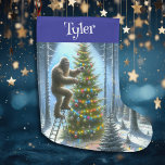 Funny Christmas Sasquatch Personalised Large Christmas Stocking<br><div class="desc">Personalised Bigfoot Christmas stocking. Bigfoot decorating Christmas trees in the forest with ornaments and Christmas lights. Moon shining through the trees. Add some sasquatch humour to your Christmas with these comic book style art.</div>