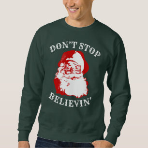 Funny Christmas Sweatshirt: "DON'T STOP BELIEVIN" Sweatshirt
