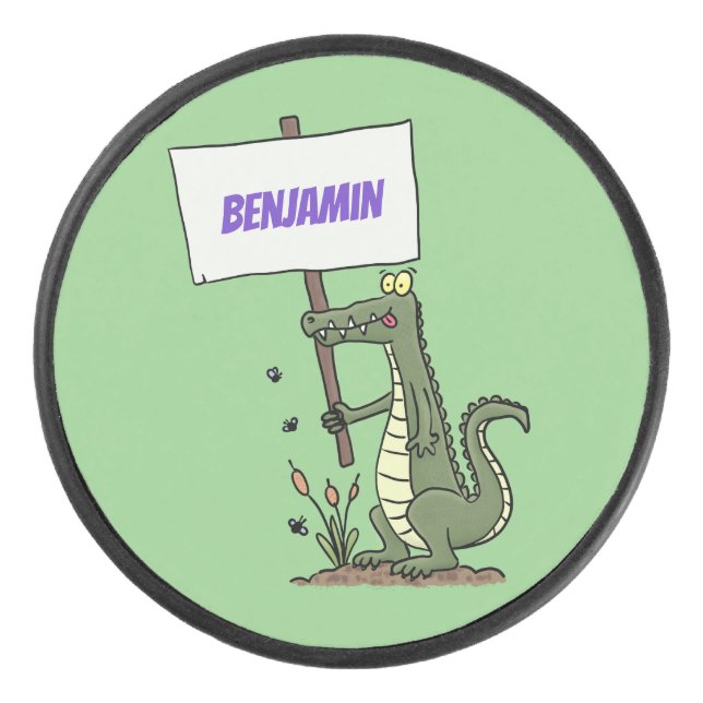 Funny crocodile aligator with sign cartoon hockey puck (Front)