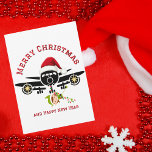 Funny Cute Elf jumping on Aeroplane,Christmas Phot Holiday Card<br><div class="desc">Funny Cute Elf jumping on Aeroplane, Christmas Photo Ornament. Design features a minimalist illustration of a big aeroplane topped with a red Santa hat. A cute Elf is seen jumping out of the aeroplane hanging onto a string of Christmas lights. The back of card has a heartfelt message to your...</div>