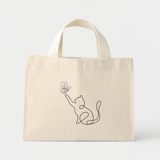 Funny cute little cat plays with a buuterfly mini tote bag (Front)