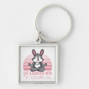 Funny cute rabbit doing yoga. funny yoga poses key ring