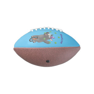 Funny cute rhino juggling on unicycle american football