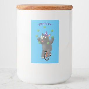 Funny cute rhino juggling on unicycle food label