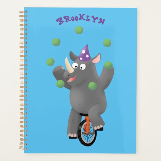 Funny cute rhino juggling on unicycle planner (Front)