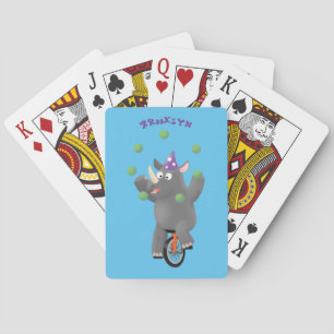 Funny cute rhino juggling on unicycle playing cards