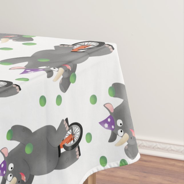 Funny cute rhino juggling on unicycle tablecloth (In Situ)
