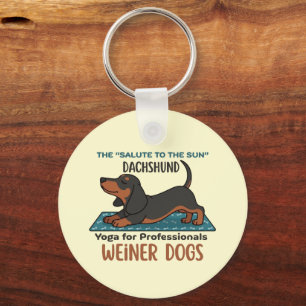 Funny dachshund doing the sun salutation (yoga) key ring