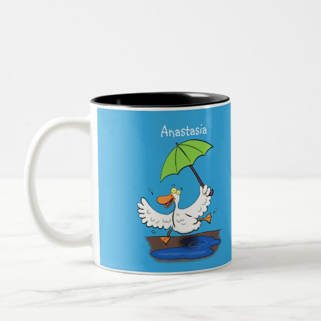 Funny duck with umbrella dancing cartoon Two-Tone coffee mug (Left)
