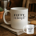 Funny Elegant Simple I'm Loving It 50th Birthday Coffee Mug<br><div class="desc">Mark a milestone with understated elegance. This minimalist birthday mug features “Fifty” in a striking serif font, followed by the fun phrase “I’m loving it” — a stylish nod to turning a new chapter. All text can be easily customised, making it perfect for any age or occasion. Thank you for...</div>