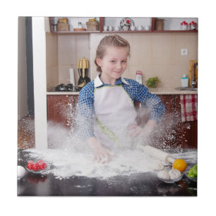 Funny girl in messy kitchen tile