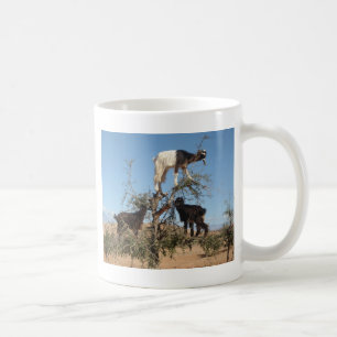 Funny goats in a tree coffee mug