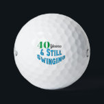 Funny Golf Balls 40th Birthday<br><div class="desc">Funny 40th Birthday Golf Balls – “Still Swinging” Gag Gift for Golf Lovers Celebrate turning 40 with a swing! These Funny Golf Balls are the perfect 40th birthday gift for golfers, featuring the hilarious message: "40 Years and Still Swinging!" A great gag gift that’s sure to score laughs on the...</div>