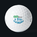 Funny Golf Balls 60th Birthday<br><div class="desc">Celebrate a golfer's 70th birthday in style with Funny Golf Balls 70th Birthday edition. These golf balls make a fun and unique gift for any golf enthusiast reaching this milestone age. With the playful inscription "70 years and still swinging!" these balls add a touch of humour and celebration to the...</div>