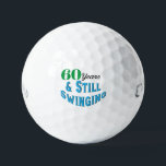 Funny Golf Balls 60th Birthday<br><div class="desc">Celebrate a golfer's 70th birthday in style with Funny Golf Balls 70th Birthday edition. These golf balls make a fun and unique gift for any golf enthusiast reaching this milestone age. With the playful inscription "70 years and still swinging!" these balls add a touch of humour and celebration to the...</div>