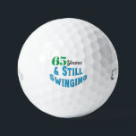 Funny Golf Balls 65th Birthday<br><div class="desc">Celebrate a golfer’s 65th birthday with Funny Golf Balls 65th Birthday edition! Featuring the playful inscription “65 years and still swinging!”, these novelty golf balls make a hilarious and memorable gift for any golf lover. Perfect for friends, family, or your favourite golfer, this unique gift brings laughter to the fairway...</div>