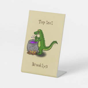Funny green alligator cooking cartoon pedestal sign