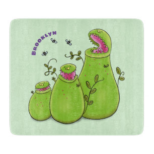 Funny green carnivorous pitcher plants cartoon cutting board