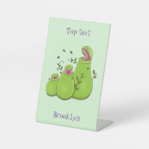 Funny green carnivorous pitcher plants cartoon pedestal sign