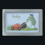 Funny green frog mowing lawn cartoon belt buckle<br><div class="desc">A funny green frog mowing the lawn in silly cartoon style.</div>