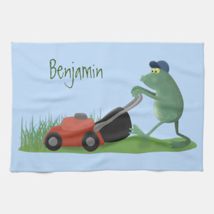 Funny green frog mowing lawn cartoon tea towel