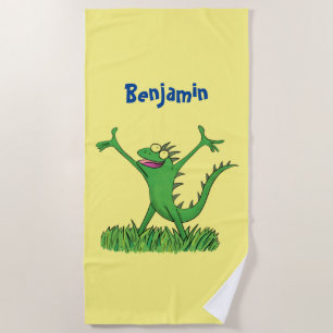 Funny green smiling animated iguana lizard  beach towel