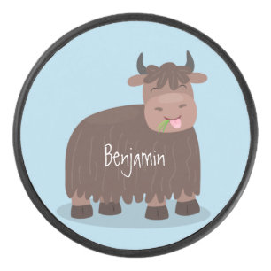 Funny happy yak eating grass cartoon illustration hockey puck