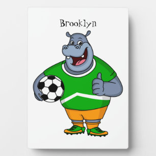 Funny hippo soccer player cartoon illustration plaque