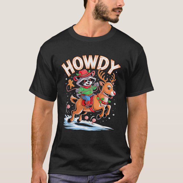 Funny Howdy Christmas Racoon Cowboy Riding Reinde T-Shirt (Front)