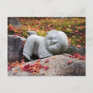 Funny Japanese monk statue with autumn leaves Postcard