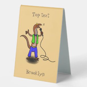 Funny lizard singing with microphone cartoon