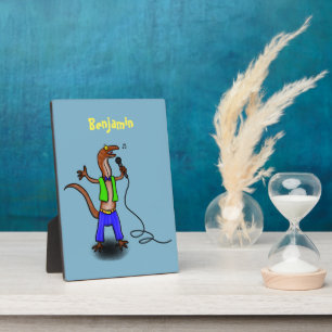 Funny lizard singing with microphone cartoon plaque
