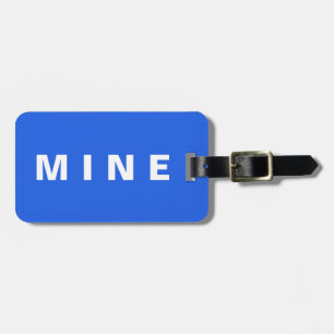 Funny luggage tag with 'Mine' written on it