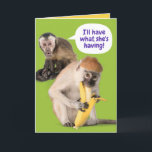 Funny Monkey I'll Have What She's Having Birthday Card<br><div class="desc">One female monkey seeing another female monkey enjoying a a banana (in a suggestive way) enviously says,  "I'll have what she's having!"  A classic line taken from the movie,  "When Harry Met Sally" in a twisted sort of way. Fun card for your female friends. All text is customisable.</div>