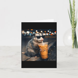 Funny opossum drinking iced coffee meme card