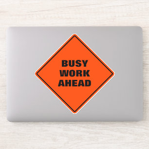 Funny orange busy work ahead pun road sign 