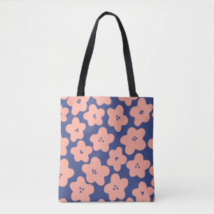 Funny pastel orange flowers on bright blue backgro tote bag