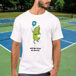 Funny Pickle Playing Pickleball Custom Text T-Shirt<br><div class="desc">The perfect shirt for a pickleball fanatic.  Design features a pickle playing pickleball.  Add custom text to personalise or delete.</div>