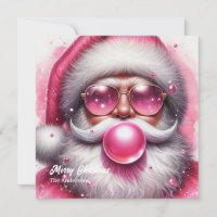 Funny pink Santa Claus blowing pink bubble gum