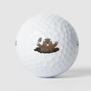Funny pocket gopher digging cartoon illustration golf balls