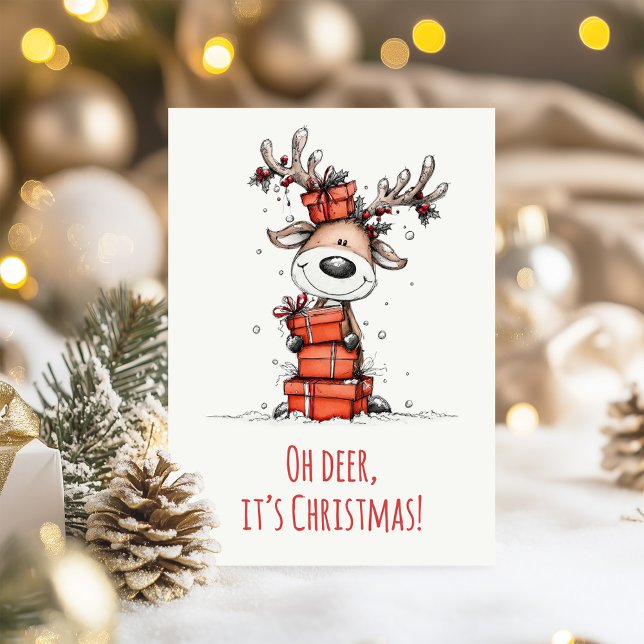 Funny Reindeer – “Oh Deer, It’s Christmas"  Holiday Card (Funny Reindeer – “Oh Deer, It’s Christmas" Holiday Card on  a table with Christmas decoration)