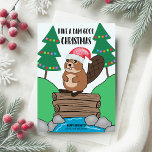 Funny Santa Beaver Dam Good Christmas Holiday Card<br><div class="desc">Share some holiday humour with this Christmas card featuring a cute beaver in a Santa hat standing atop its dam in a stream bordered by Christmas trees. The playful greeting “Have a Dam Good Christmas” adds just the right amount of cheeky charm. Perfect for nature lovers, pun fans, or anyone...</div>