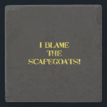 Funny Scapegoat Quote A Bold Statement on Blame Stone Coaster<br><div class="desc">This striking image delivers a punchy message—"I BLAME THE SCAPEGOATS!"—in distressed yellow stencil text against a stark black background. It's a satirical take on the human tendency to deflect responsibility,  making it perfect for social commentary,  humor,  or protest-themed content. #BlameCulture #SatireArt #ScapegoatStatement #BoldTypography</div>