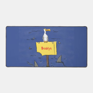 Funny sea bird circled by sharks cartoon desk mat