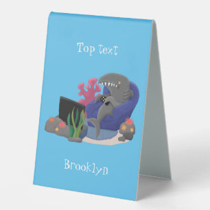 Funny shark watching TV cartoon