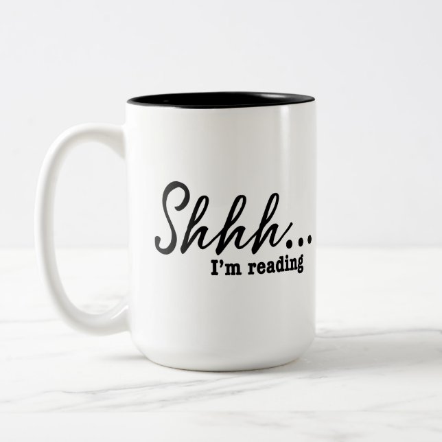 Funny Shhh...I'm reading Reader Two-Tone Coffee Mug (Left)