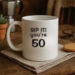 Funny Sip It You're Fifty 50th Birthday Coffee Mug<br><div class="desc">Sip Happens—You're 50! Add a splash of humour to their morning brew with this bold and cheeky birthday mug! Featuring the quote “Sip It! You're 50” in a clean black-letter design, it’s the perfect mix of sass and celebration. The age can be customised, making it great for any milestone—30, 40,...</div>