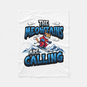 Funny skiing cat the meowtains are calling fleece blanket
