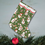 Funny Snowman Pattern on Green Large Christmas Stocking<br><div class="desc">This cute Holiday stocking has images of cartoon snowmen in various activities, including skiing, skating, and shopping for Christmas. The images are primarily in black, red, blue, and gold, and placed on a Christmas green background. A white scalloped edge design bordered in red holds your customised name at the top....</div>